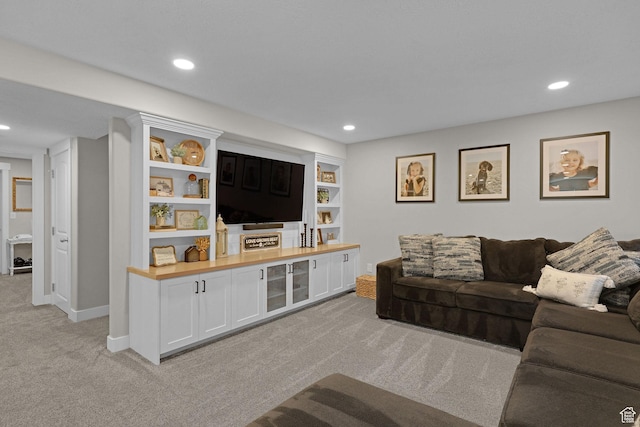 12473 S Desert Mesa Dr, Herriman, UT 84096 - living room featuring light colored carpet, recessed lighting, and baseboards