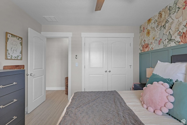12473 S Desert Mesa Dr, Herriman, UT 84096 - bedroom with a closet, baseboards, and ceiling fan