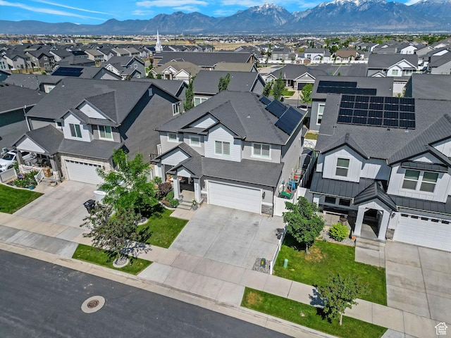 12473 S Desert Mesa Dr, Herriman, UT 84096 - aerial perspective of suburban area with a mountain backdrop