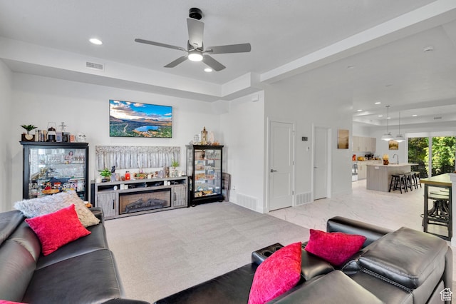 4022 S Burch Creek Way S, Ogden, UT 84405 - living room with a ceiling fan, recessed lighting, and a raised ceiling