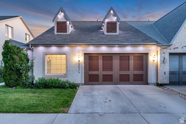 3094 E Somerset Dr, Spanish Fork, UT 84660 - view of front facade featuring concrete driveway, a front lawn, roof with shingles, a garage, and stucco siding