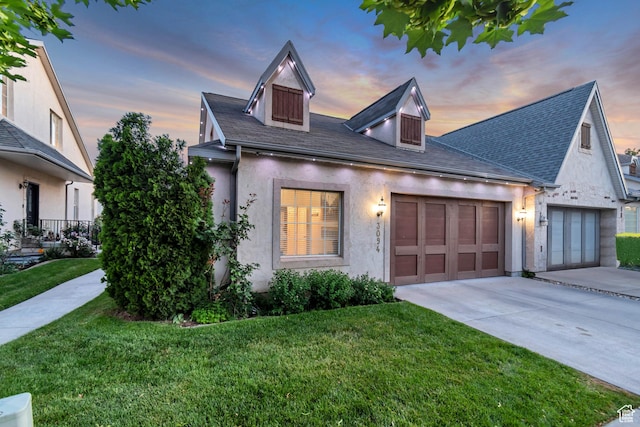 3094 E Somerset Dr, Spanish Fork, UT 84660 - view of front of property featuring concrete driveway, a front lawn, a garage, and stucco siding
