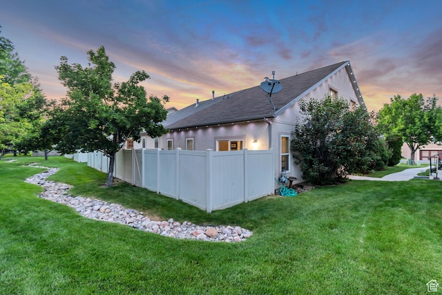3094 E Somerset Dr, Spanish Fork, UT 84660 - back of house at dusk with roof with shingles and stucco siding