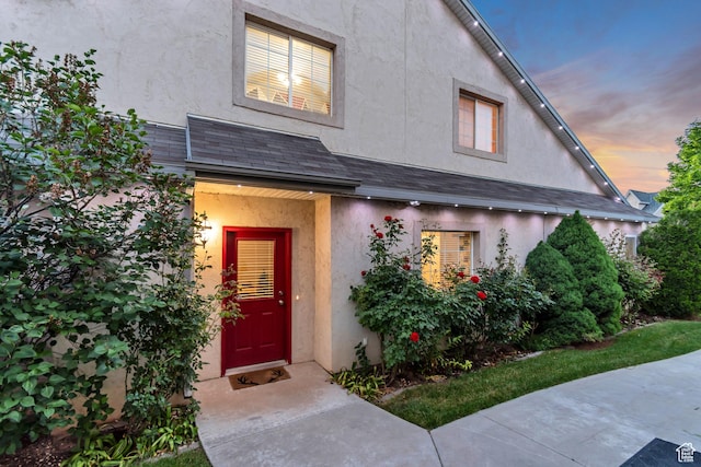 3094 E Somerset Dr, Spanish Fork, UT 84660 - exterior entry at dusk with stucco siding