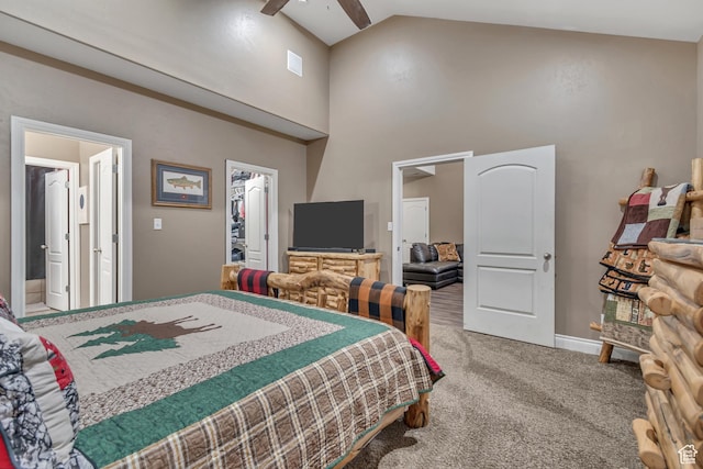 3094 E Somerset Dr, Spanish Fork, UT 84660 - carpeted bedroom with a walk in closet, high vaulted ceiling, baseboards, ensuite bathroom, and ceiling fan
