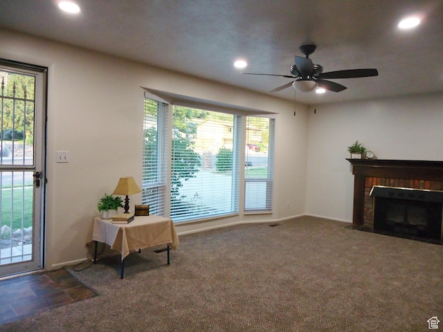 783 N Highland Blvd, Brigham City, UT 84302 - living area featuring ceiling fan, recessed lighting, a brick fireplace, baseboards, and carpet floors