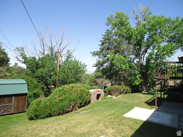 783 N Highland Blvd, Brigham City, UT 84302 - view of grassy yard with a wooden deck