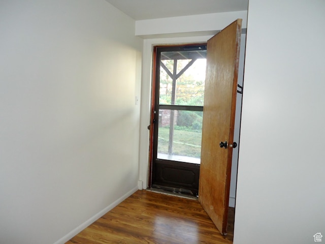 783 N Highland Blvd, Brigham City, UT 84302 - doorway to outside featuring wood finished floors and baseboards