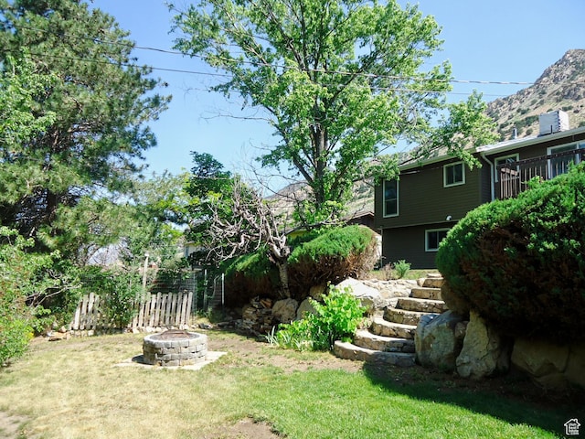 783 N Highland Blvd, Brigham City, UT 84302 - view of grassy yard with a fire pit and a mountain view