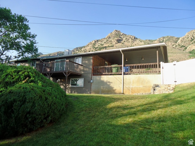 783 N Highland Blvd, Brigham City, UT 84302 - rear view of house featuring a deck with mountain view