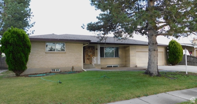 4781 S 3040 W, Taylorsville, UT 84129 - ranch-style home with an attached garage, brick siding, concrete driveway, a front lawn, and roof with shingles