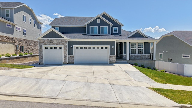 833 N Union Bench Dr W Unit 62, Mapleton, UT 84664 - craftsman house with stone siding, board and batten siding, concrete driveway, and covered porch