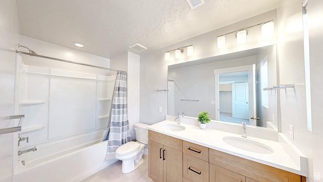 833 N Union Bench Dr W Unit 62, Mapleton, UT 84664 - bathroom with shower / bath combo, double vanity, toilet, tile patterned flooring, and a textured ceiling