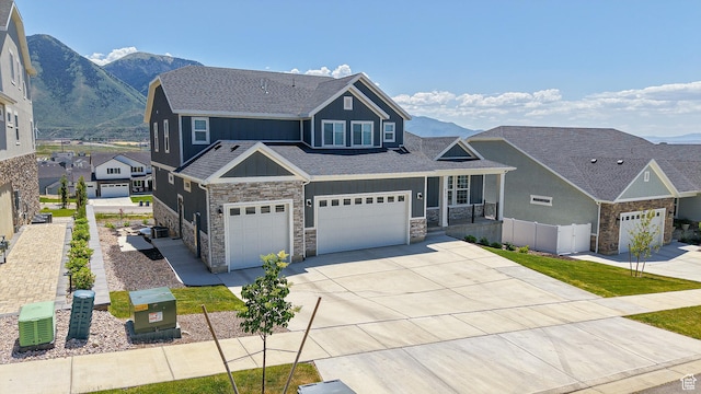 833 N Union Bench Dr W Unit 62, Mapleton, UT 84664 - craftsman inspired home featuring board and batten siding, stone siding, a garage, and roof with shingles