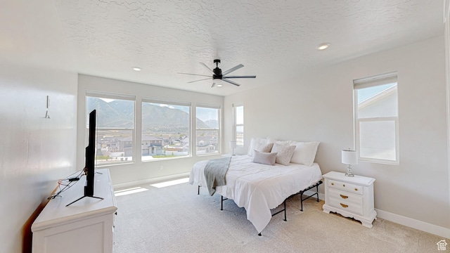 833 N Union Bench Dr W Unit 62, Mapleton, UT 84664 - bedroom featuring light colored carpet, baseboards, a textured ceiling, ceiling fan, and recessed lighting