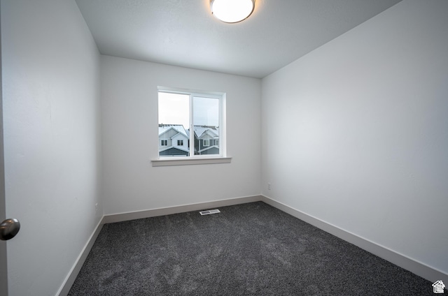 622 S 85 E Unit 4, Smithfield, UT 84335 - spare room with dark carpet and baseboards