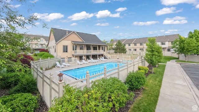 1029 Independence, Provo, UT 84604 - community pool featuring a fenced backyard, a residential view, and stairs
