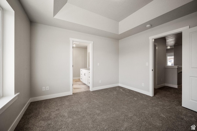 636 S 85 E Unit 6, Smithfield, UT 84335 - unfurnished bedroom featuring carpet, baseboards, and ensuite bathroom