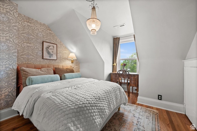 237 E 4th Ave N, Salt Lake City, UT 84103 - bedroom with wallpapered walls, baseboards, wood finished floors, and lofted ceiling