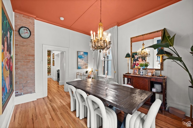 237 E 4th Ave N, Salt Lake City, UT 84103 - dining room with a chandelier, light wood finished floors, ornamental molding, and baseboards