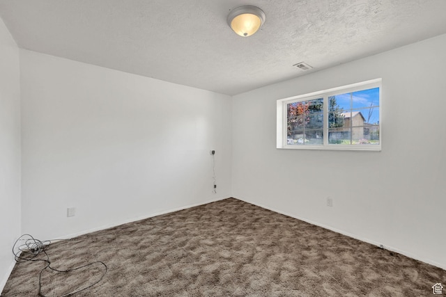 2652 W 6050 S, Roy, UT 84067 - carpeted empty room featuring a textured ceiling and baseboards