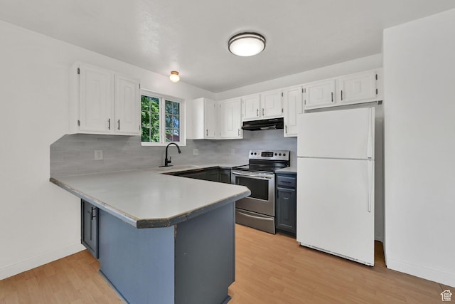 2652 W 6050 S, Roy, UT 84067 - kitchen featuring freestanding refrigerator, electric stove, under cabinet range hood, a sink, and white cabinets