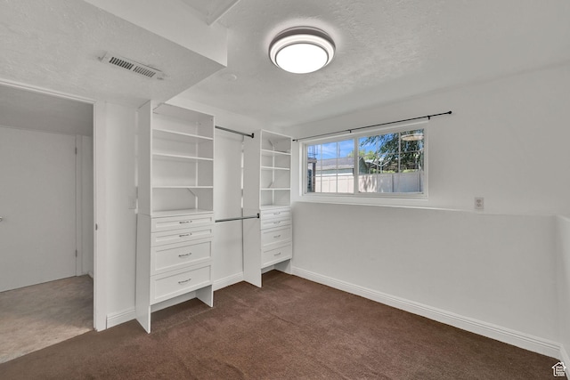 2652 W 6050 S, Roy, UT 84067 - unfurnished bedroom with dark carpet, a textured ceiling, and baseboards