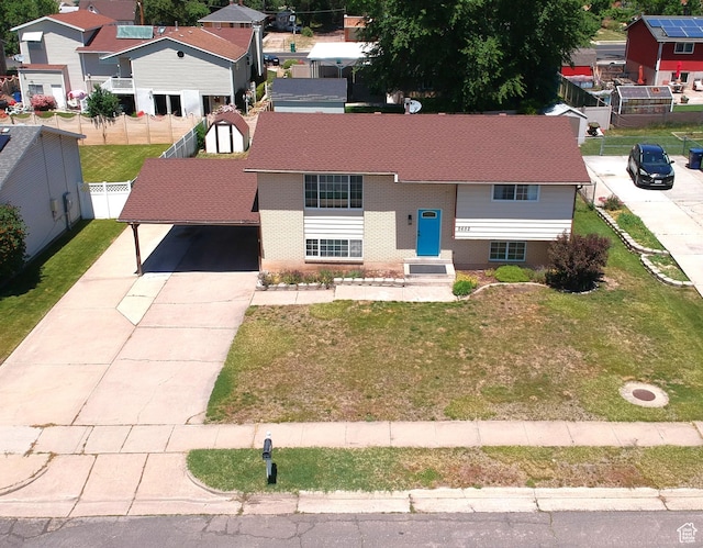 2652 W 6050 S, Roy, UT 84067 - view of front of property with driveway, a shingled roof, and a residential view