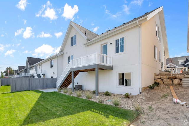 11839 S Harvest Gold Way, Riverton, UT 84065 - rear view of property featuring stucco siding, central air condition unit, a deck, stairs, and a residential view