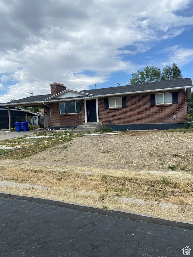 7162 S 2180 W, West Jordan, UT 84084 - ranch-style home featuring brick siding and a chimney