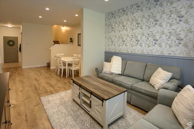 58 N 285 W, Centerville, UT 84014 - living room with light wood-type flooring, recessed lighting, wallpapered walls, stairs, and a wainscoted wall
