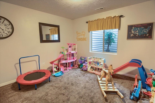 58 N 285 W, Centerville, UT 84014 - playroom featuring carpet flooring, a textured ceiling, and baseboards