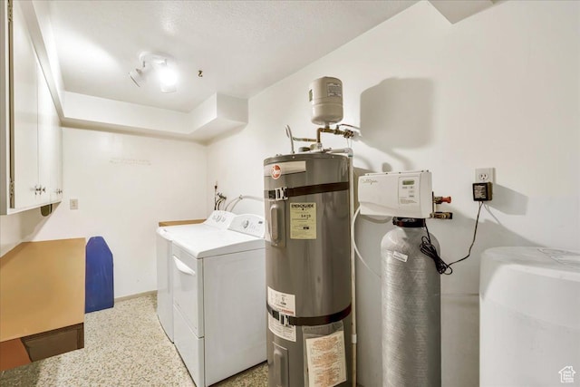 5424 S 850 E, South Ogden, UT 84405 - laundry area with washer and clothes dryer, water heater, cabinet space, and baseboards