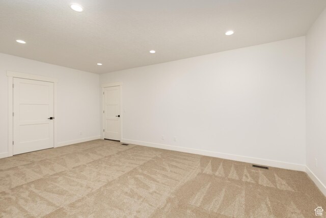 6552 W Timber Ranch Dr, Herriman, UT 84096 - empty room with light colored carpet, recessed lighting, and baseboards