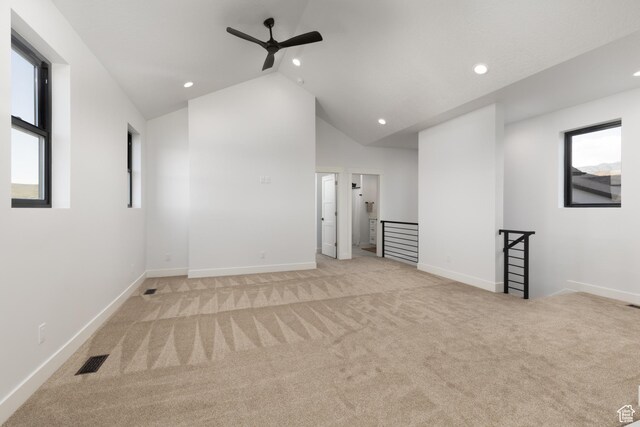 6552 W Timber Ranch Dr, Herriman, UT 84096 - empty room featuring ceiling fan, recessed lighting, light colored carpet, vaulted ceiling, and baseboards