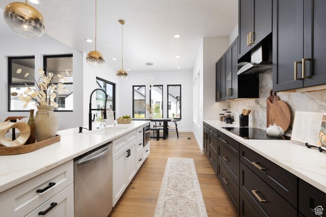 6552 W Timber Ranch Dr, Herriman, UT 84096 - kitchen with dishwasher, tasteful backsplash, a sink, decorative light fixtures, and light wood finished floors