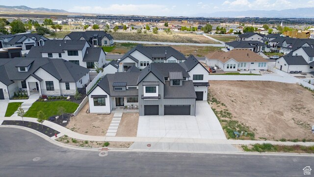 6552 W Timber Ranch Dr, Herriman, UT 84096 - aerial view of residential area with mountains