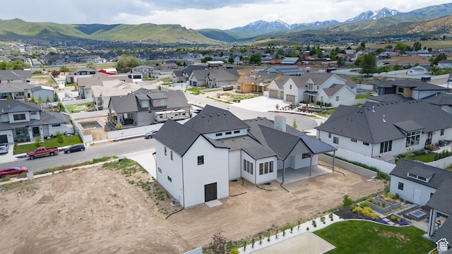 6552 W Timber Ranch Dr, Herriman, UT 84096 - aerial view of residential area featuring a mountain backdrop