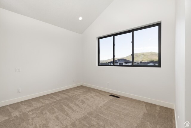 6552 W Timber Ranch Dr, Herriman, UT 84096 - carpeted spare room featuring baseboards and high vaulted ceiling