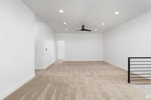 6552 W Timber Ranch Dr, Herriman, UT 84096 - unfurnished room with light colored carpet, recessed lighting, baseboards, and ceiling fan