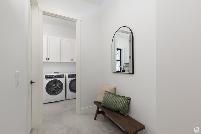 6552 W Timber Ranch Dr, Herriman, UT 84096 - washroom featuring independent washer and dryer, cabinet space, and baseboards