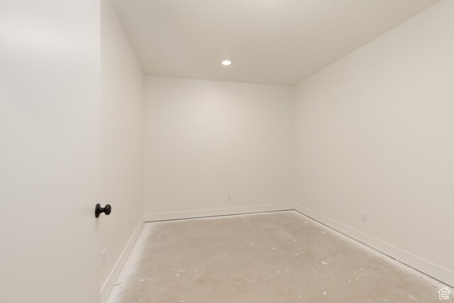 6552 W Timber Ranch Dr, Herriman, UT 84096 - empty room with baseboards, concrete flooring, and recessed lighting