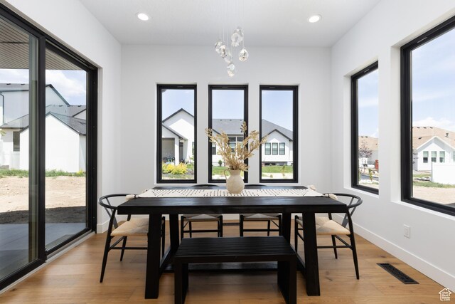 6552 W Timber Ranch Dr, Herriman, UT 84096 - dining space featuring a chandelier, light wood-type flooring, baseboards, and recessed lighting