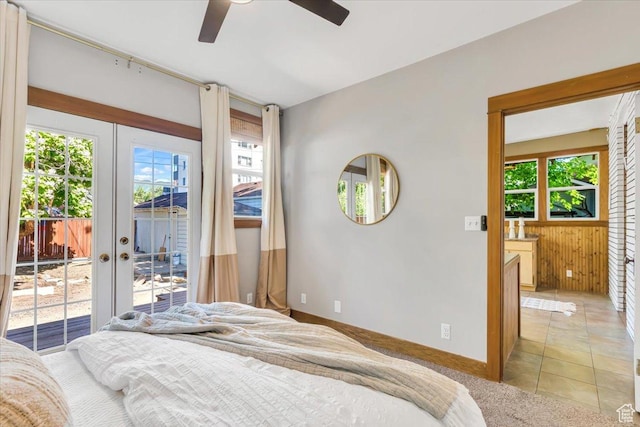 457 S Douglas St E, Salt Lake City, UT 84102 - bedroom featuring access to outside, french doors, wooden walls, baseboards, and ceiling fan