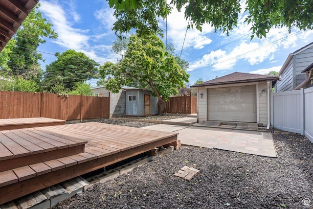 457 S Douglas St E, Salt Lake City, UT 84102 - wooden deck with an outbuilding and a fenced backyard