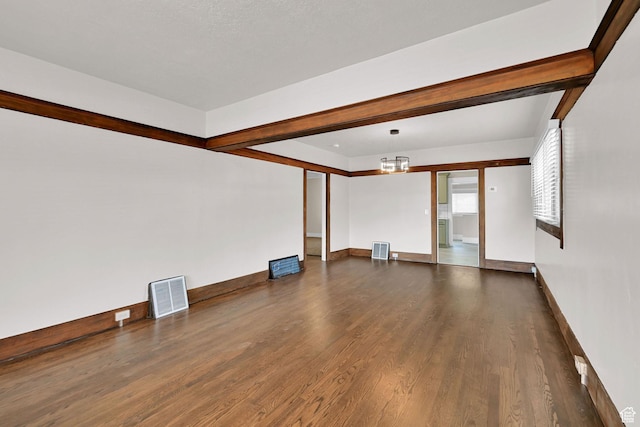 2654 Brinker Ave, Ogden, UT 84401 - unfurnished living room with wood finished floors and baseboards