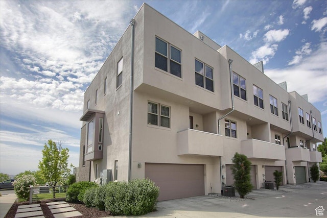 4508 W Kestrel Ridge Rd, South Jordan, UT 84009 - view of property with a garage and central AC unit