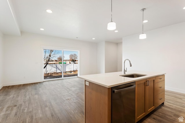1687 W 2770 S Unit 204, Syracuse, UT 84075 - kitchen with dishwasher, a sink, open floor plan, wood finished floors, and baseboards