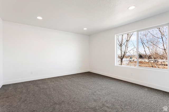 1687 W 2770 S Unit 204, Syracuse, UT 84075 - empty room featuring recessed lighting, dark colored carpet, and baseboards