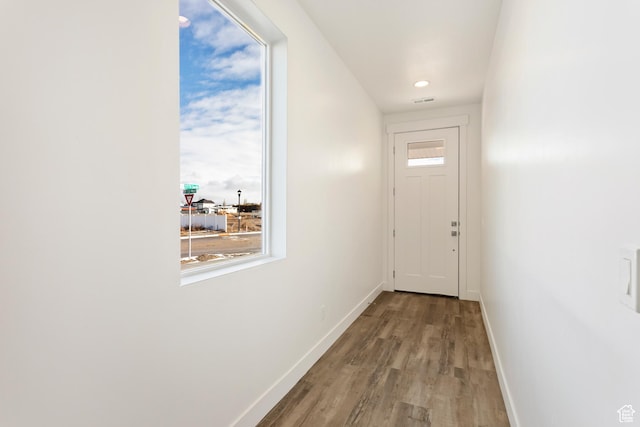 1687 W 2770 S Unit 204, Syracuse, UT 84075 - doorway with baseboards, wood finished floors, and recessed lighting